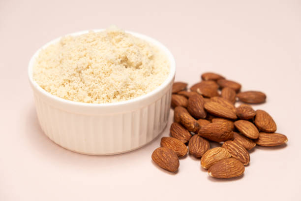 istock Almond flour and almonds on a beige background 2065964168