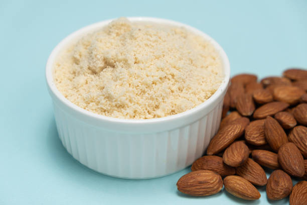 istock Almond flour and almonds on a light blue background 2065964453