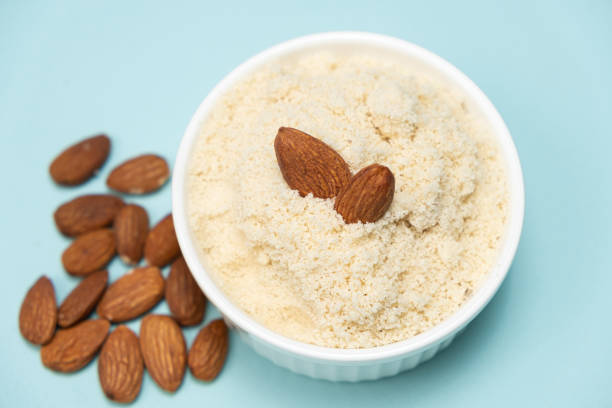 istock Almond flour and almonds on a light blue background 2065964456
