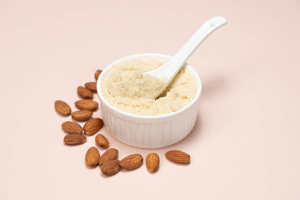istock Almond flour and almonds on a beige background 2065964460