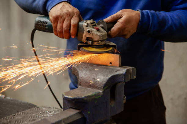istock Heavy industry worker cutting steel with an angle grinder. 2065985444