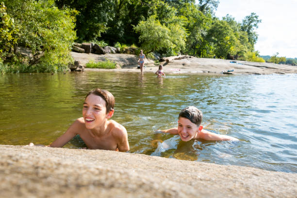 Friends swimming in the river