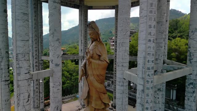 Statue of Guanyin, in biggest Buddhist temple in George Town, Penang, Malaysia, close up