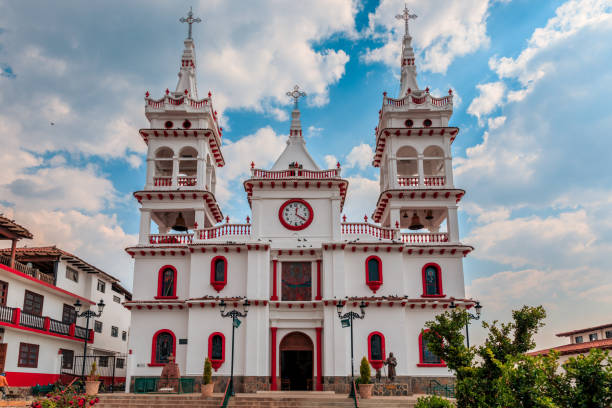 Cathedral building amidst lush greenery: Mazamitla, Jalisco, Mexico