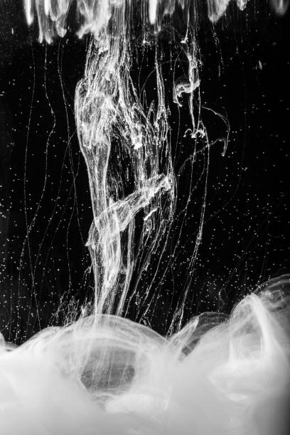 istock White ink in water, abstract background 2066047711