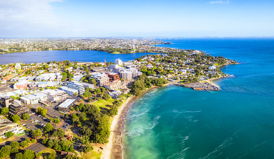 An aerial view of part of Auckland's North Shore with Takapuna beach in the foreground, looking northwards.