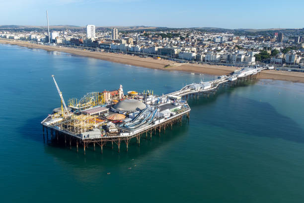 istock Pier being built over a calm blue ocean: Brighton, West Pier 2066068436
