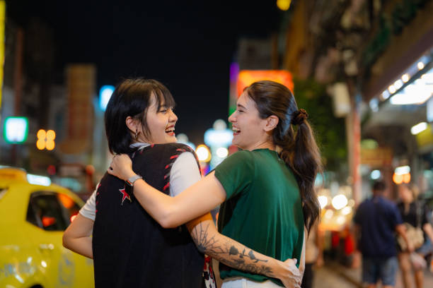istock Asian woamn Enjoying a Night Stroll on Yaowarat Road. 2066087373