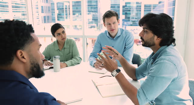 Middle-aged 40s Indian male boss lead negotiations