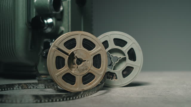 Old-fashioned 8mm film movie projector with two film reels