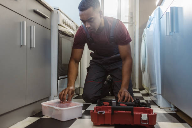 istock African American handyman preparing tools at the customer's home 2066196555