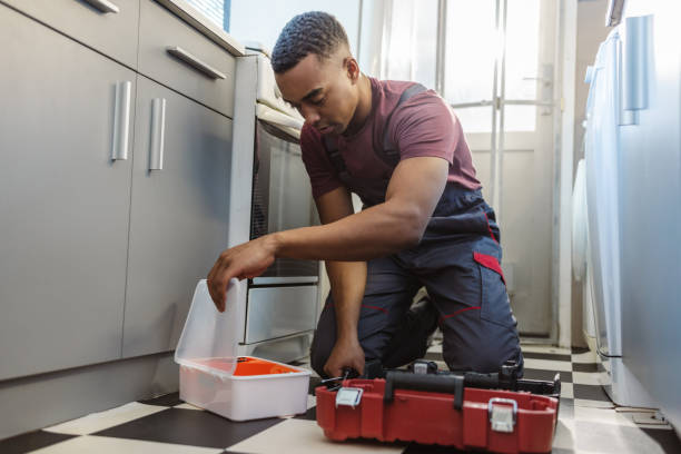 istock African American handyman preparing tools at the customer's home 2066197068