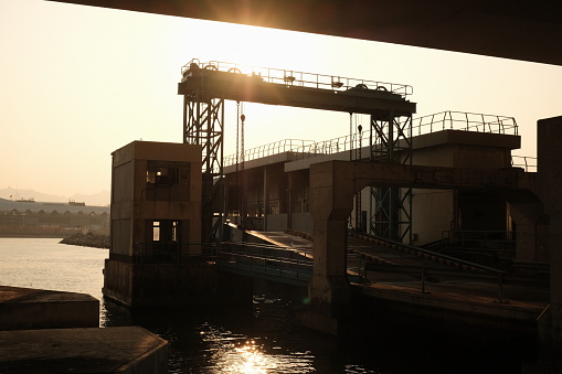 old bridge to vehicular ferry, sea transport