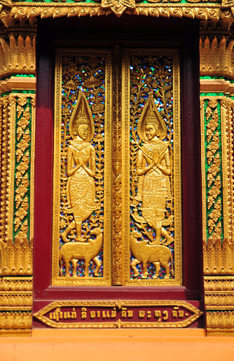 Vientiane, Laos: main door of the congregation hall (sim) at Wat Inpeng Voraamahavihanh or “Temple of the Incarnation of Indra”  - Buddhist temple originally built in the 16th century, though the present structure dates from the 19th century  - corner of Khun Bu Lom and Samsenthai streets.