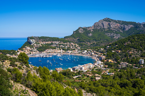 Beautiful view of the coast in Port de Soller, harbor for yachts and ships on the island of Mallorca, Spain, Mediterranean Sea