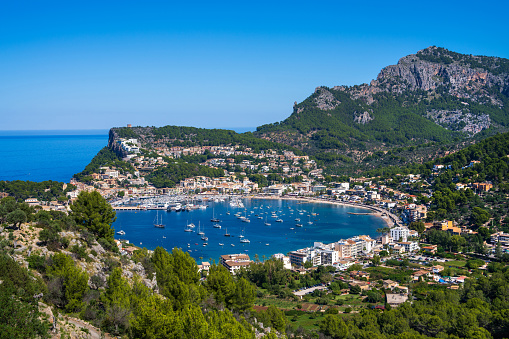 Beautiful view of the Port de Soller coastline. Harbor with many yachts and ships. Mallorca island, Spain, Mediterranean Sea. Balearic Islands