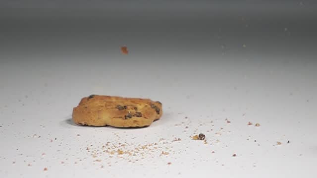 cookie falling on table slow motion