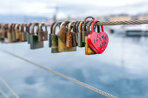 heart shape metal locks on bridge, copy  space, romantic Valentine's day greeting card