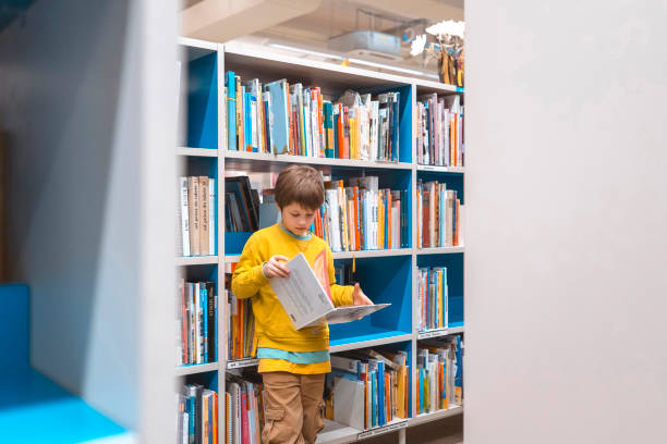 istock Young kid at the public library 2066361257