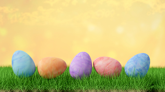 Happy Easter, painted eggs on grass meadow background with copy space, 3d render.