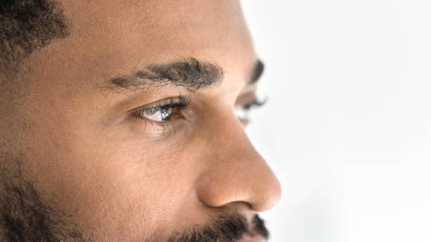 istock Handsome young African man looking away banner shot 2066384975