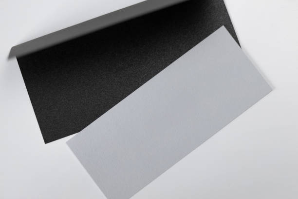 istock Contrast of Textures and Colors: Black and White Paper Sheets 2066386543