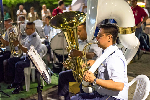 Cali,Colombia - 10,5,2018:Musician playing tuba and sousaphone with the air force symphonic band at bulevar del rio