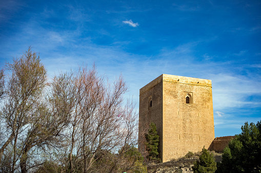 View of the imposing Alfonsina tower of the medieval castle of Lorca, Region of Murcia, Eepaña, in daylight
