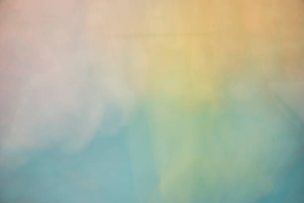 istock Turquoise and yellow colour swirls 2066421776