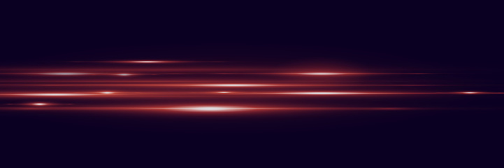 Abstract red light glare effect on a dark background.
