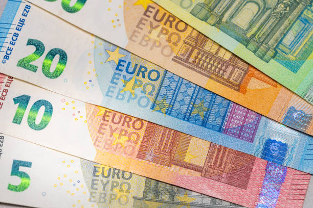 different types of euro banknotes, economics and fiscal policy of the euro zone, flat lay, financial and business concept - euro symbol crisis time debt photos et images de collection