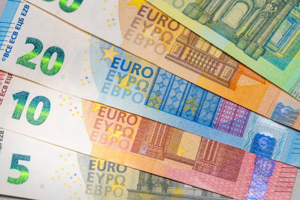 different types of euro banknotes, economics and fiscal policy of the euro zone, flat lay, financial and business concept - euro symbol crisis time debt zdjęcia i obrazy z banku zdjęć