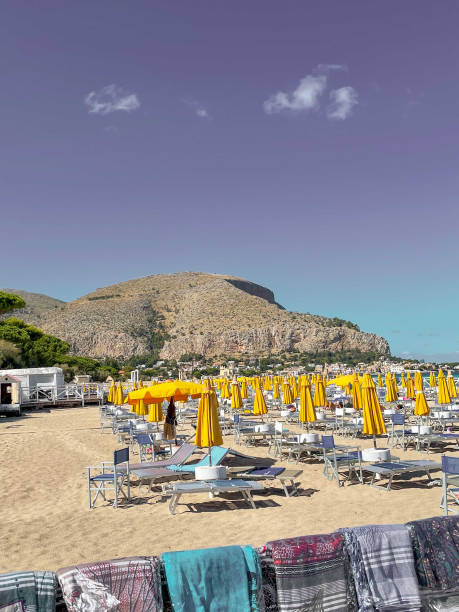 istock Yellow umbrellas on te Mediterranean  beach 2066444866