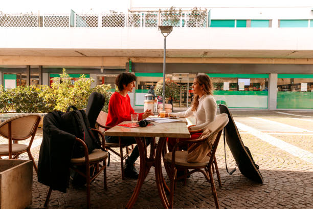 istock Two conservatory students spend good time together in a bar 2066453272