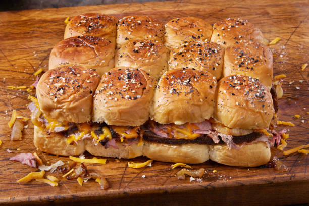 Preparing the Copycat Hawaiian Roll Roast Beef and Cheddar Sliders with Fried Onions and au Jus