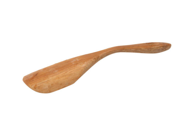 istock Wooden spatula for spices, tea isolated on a white background. 2066471147