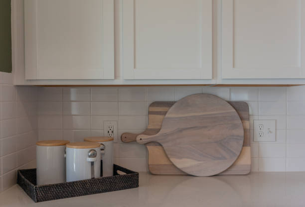 istock White modern farmhouse cabinets and kitchen counter with cutting boards 2066482128