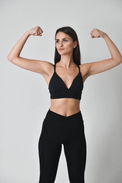 istock Female Beauty Demonstrating Strength 2066497260