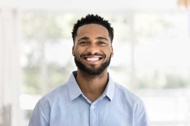 istock Cheerful handsome young African man head shot front portrait 2066540671