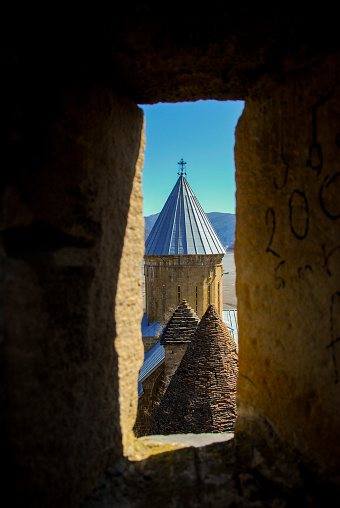 View through watchtower window of medieval churches