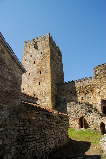 View of the fortification wall and watchtower with stone stairs