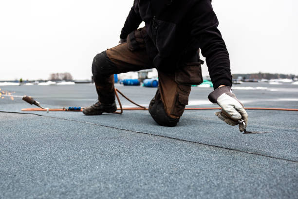 istock professional roofer applying bitumen roll on flat roof with a gas burner at a modern construction site 2066589986