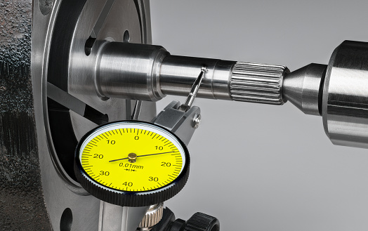 Precise mechanical tool at measuring runout of steel rotor of rotary vane compressor of pump