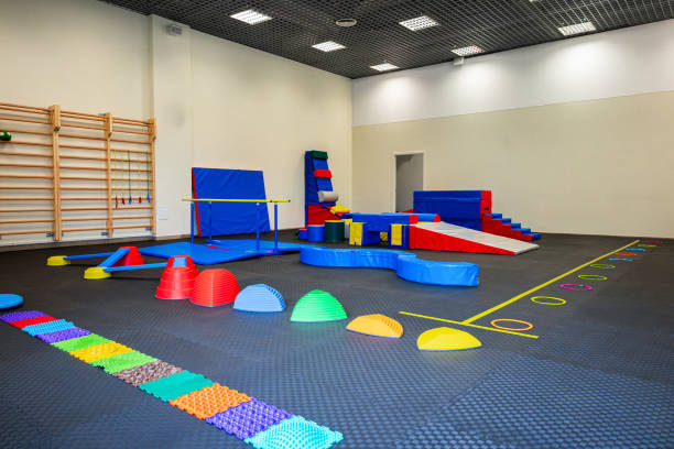 istock Colorful Gymnastic Equipment in Modern Training Room Kid's Physical Development Zone 2066639434