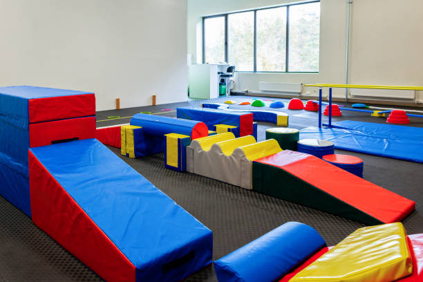 istock Colorful Gymnastic Equipment in Modern Training Room Kid's Physical Development Zone 2066639443