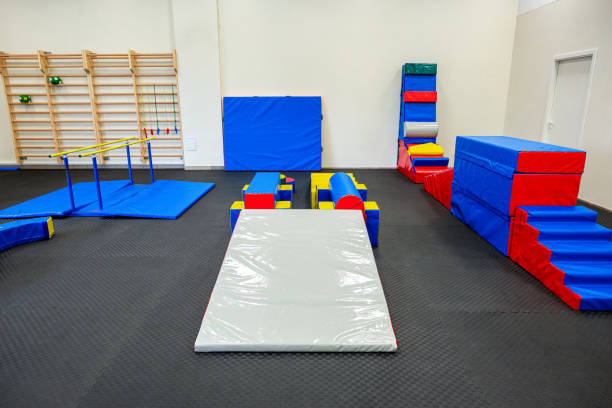 istock Colorful Gymnastic Equipment in Modern Training Room Kid's Physical Development Zone 2066640008
