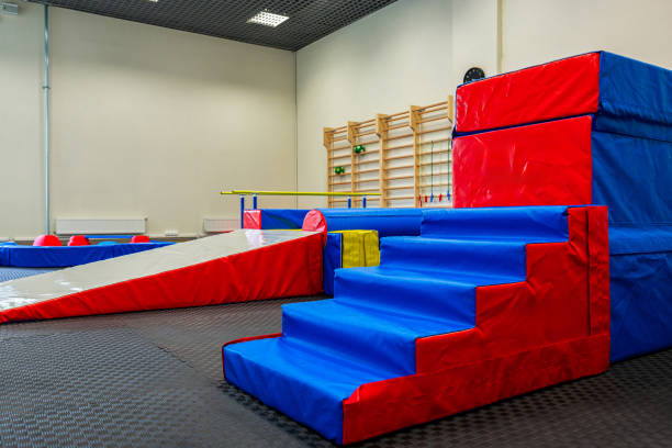 istock Dynamic Gym Setup for Kids: Colorful and Safe Equipment for Active Playtime. 2066640011