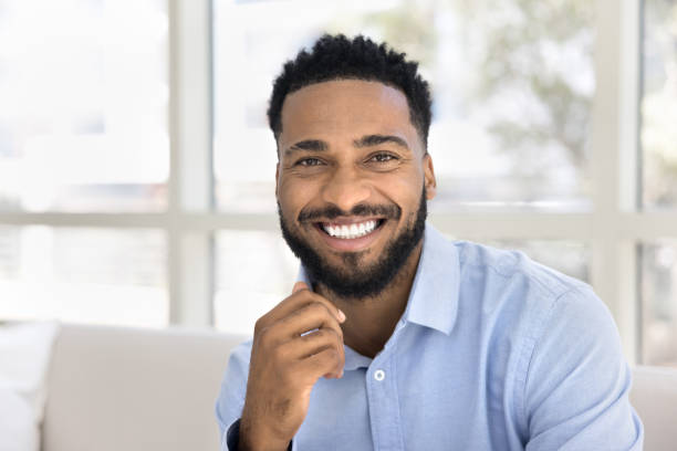 istock Happy joyful handsome young African guy looking at camera 2066641085