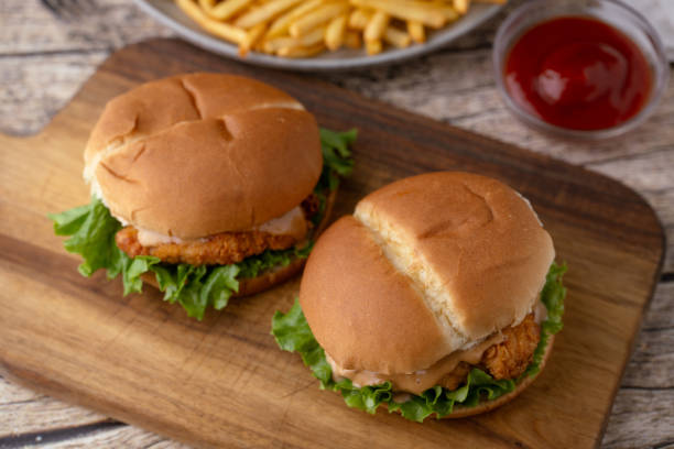 istock fried chicken sandwich with french fries 2066672930