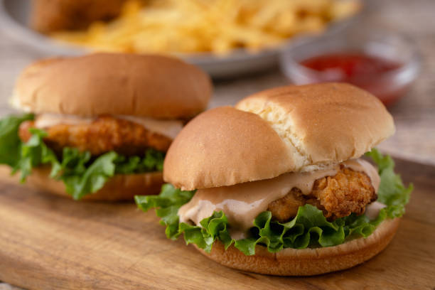 istock fried chicken sandwich with french fries 2066674519